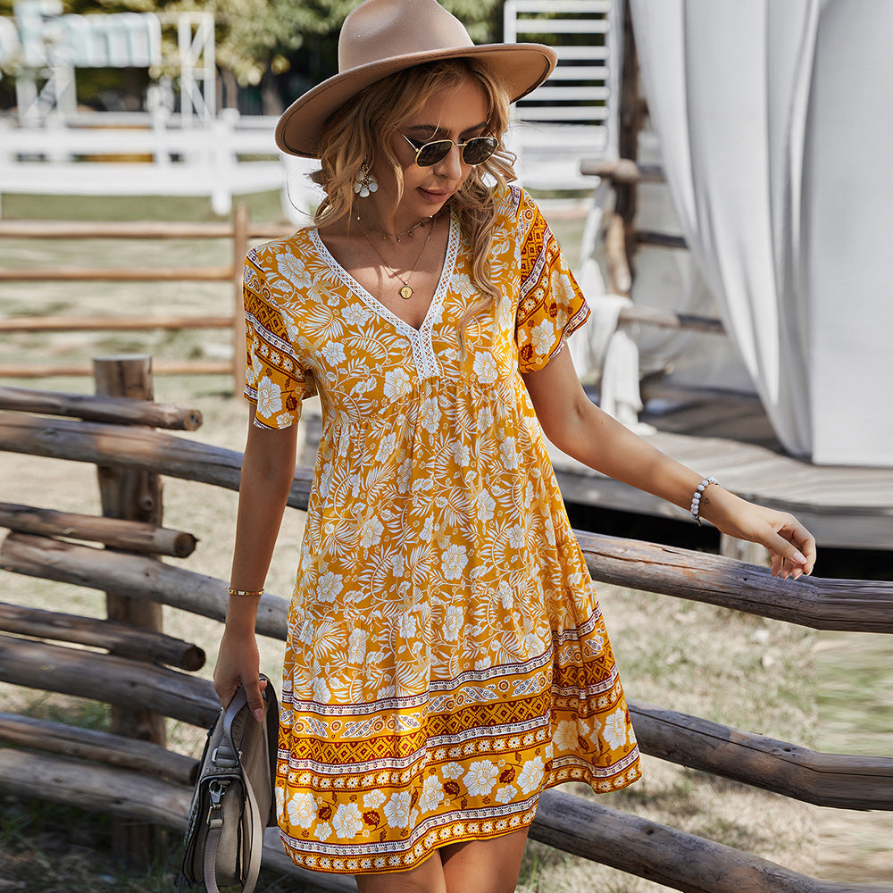 "Women's boho floral summer dress with V-neck – lightweight casual beachwear 2025"