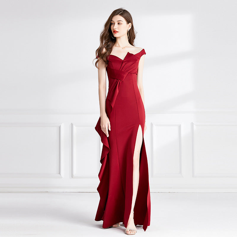 Women’s red sleeveless party dress – side pose