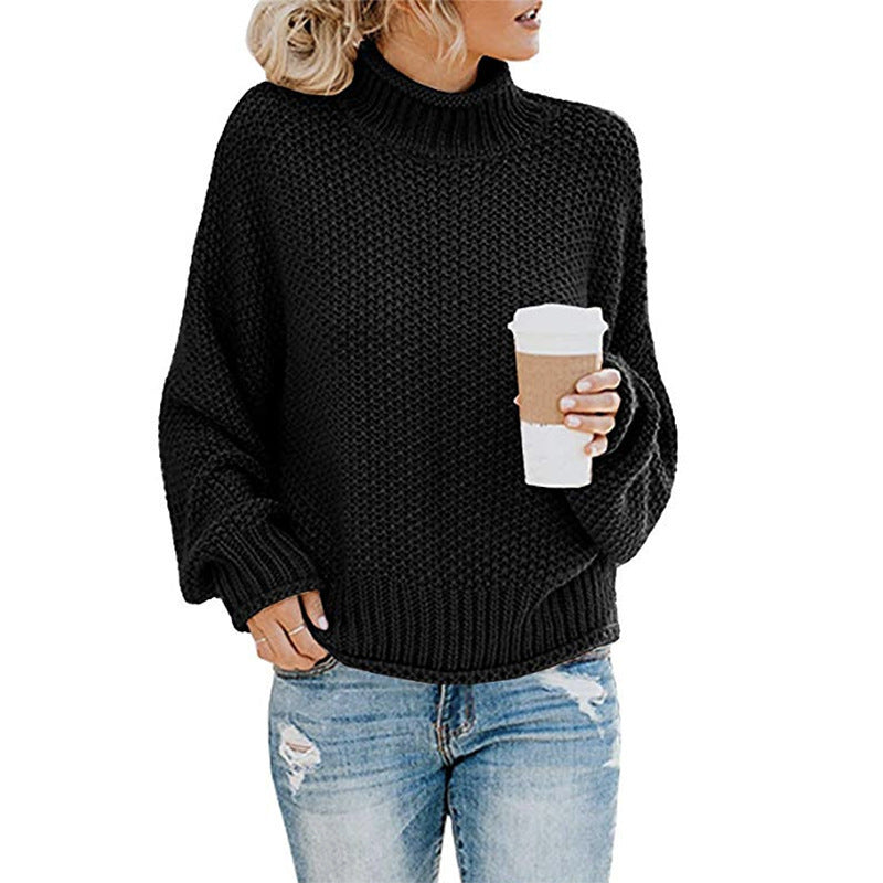 Warm thick-knit sweater with high turtleneck and ribbed cuffs