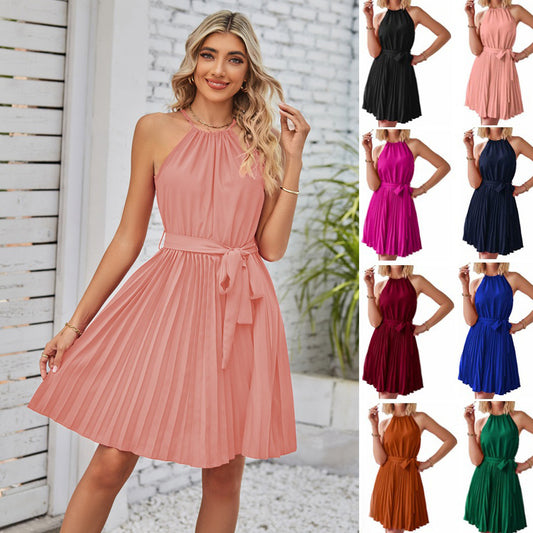 Woman in sleek sleeveless party dress for summer evening wear
