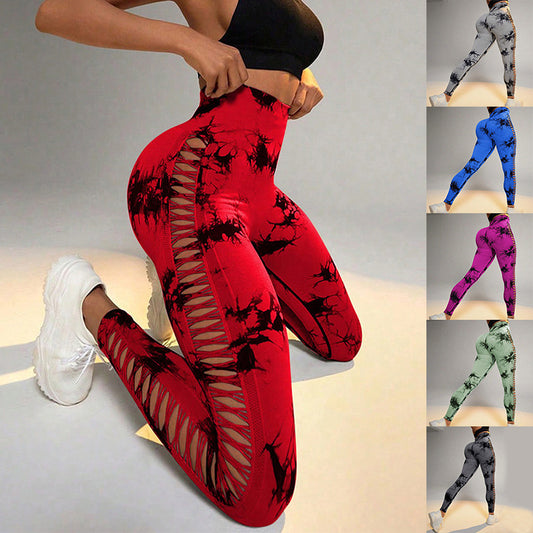 Woman in tie-dye seamless yoga leggings posing outdoors