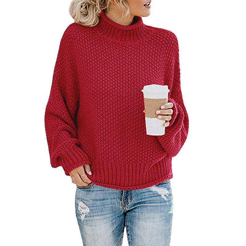 Gardian chunky knit pullover displayed folded on wooden table