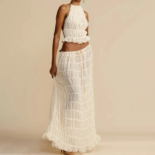 Breezy pleated skirt and halter combo for warm beach days