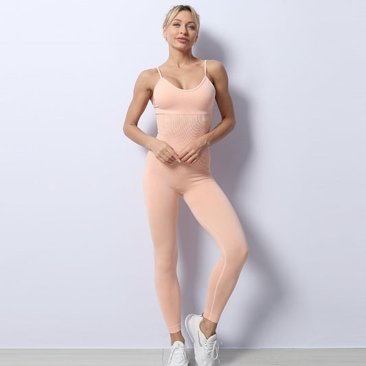 Woman in seamless knitted fitness yoga jumpsuit